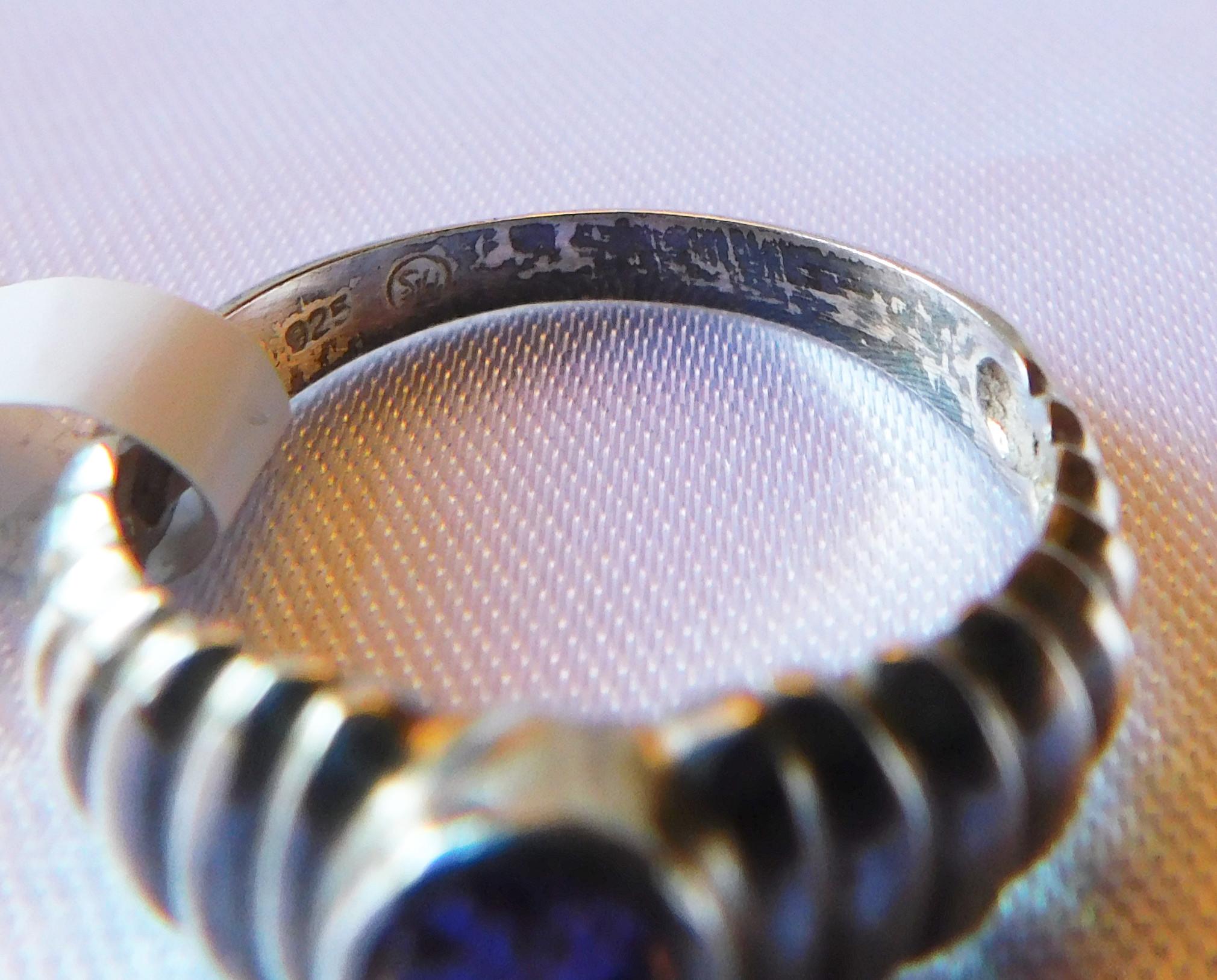 Sterling Silver Size 9 Ring with Purple Center Stone  # 20618