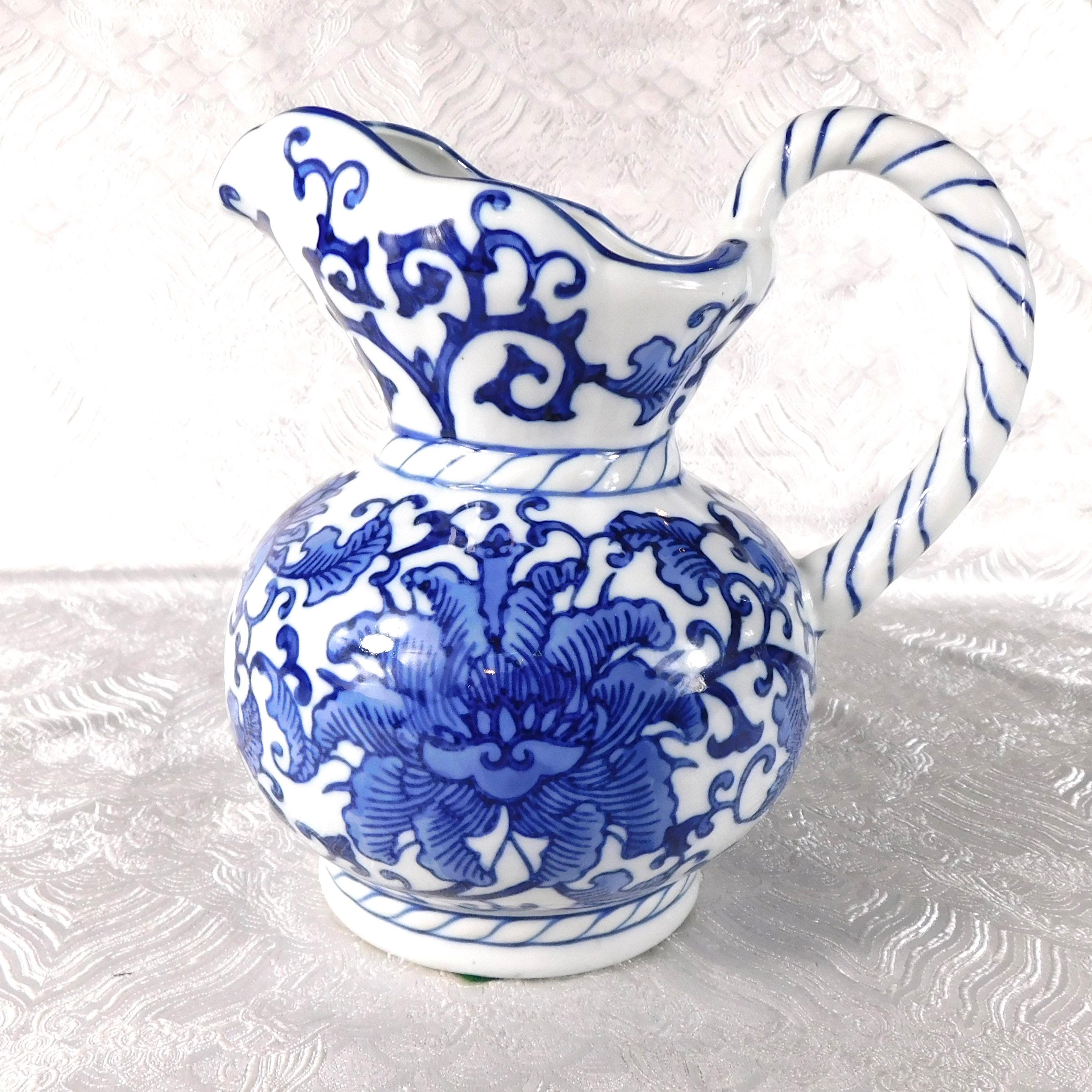 White and Blue Floral Ceramic Pitcher Made for Seymour Mann # 27681